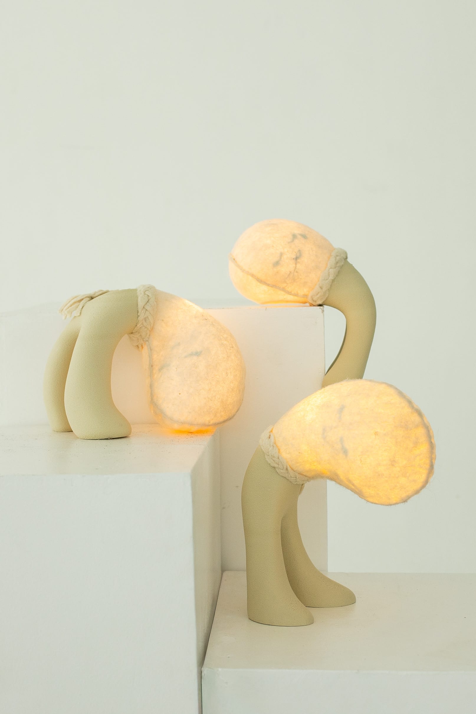 “It’s Okay” by Chini Lichangco is a collection of rechargeable table lamps, made from hand-sculpted in clay and finished with hand-stitched pineapple fiber.